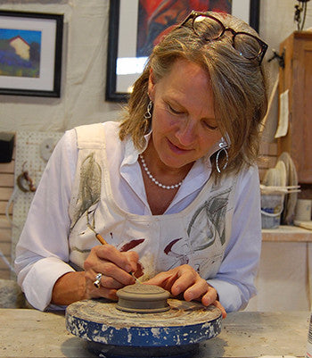 Ceramic cremation urn artist Michelle Kaisersatt at work.