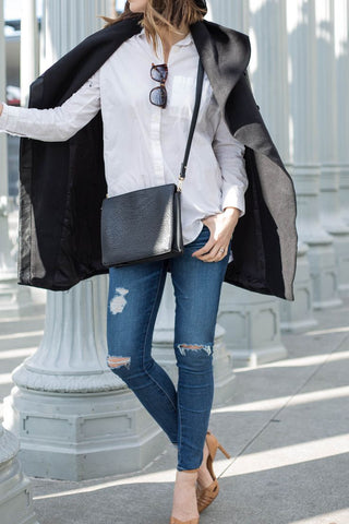 Fashion blogger Michelle Madsen wears distressed AG Jeans