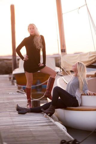 Laura Jean models by the boats at Fort Adams, photo by Maaike Bernstrom