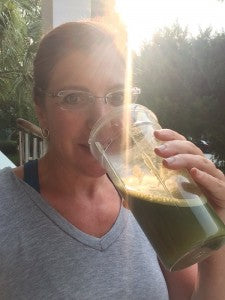 Dr. Anna drinking healthy green drink