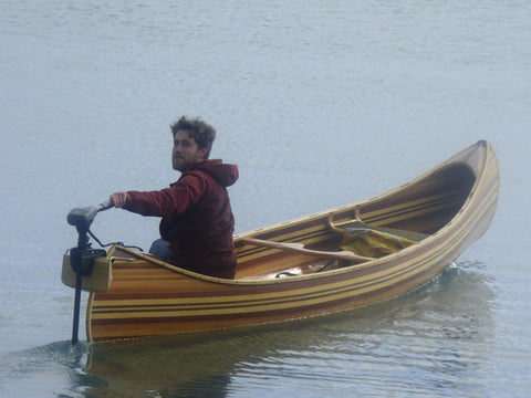 Hamish Hamilton's Nomad 17 canoe with motor attached