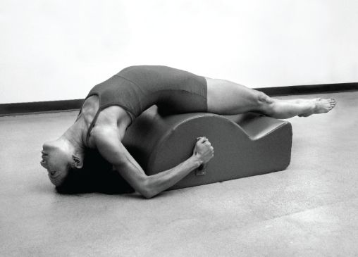 Gratz Gallery | Sandy Shimoda performing the Leg Circles onto the Head exercise on the Spine Corrector