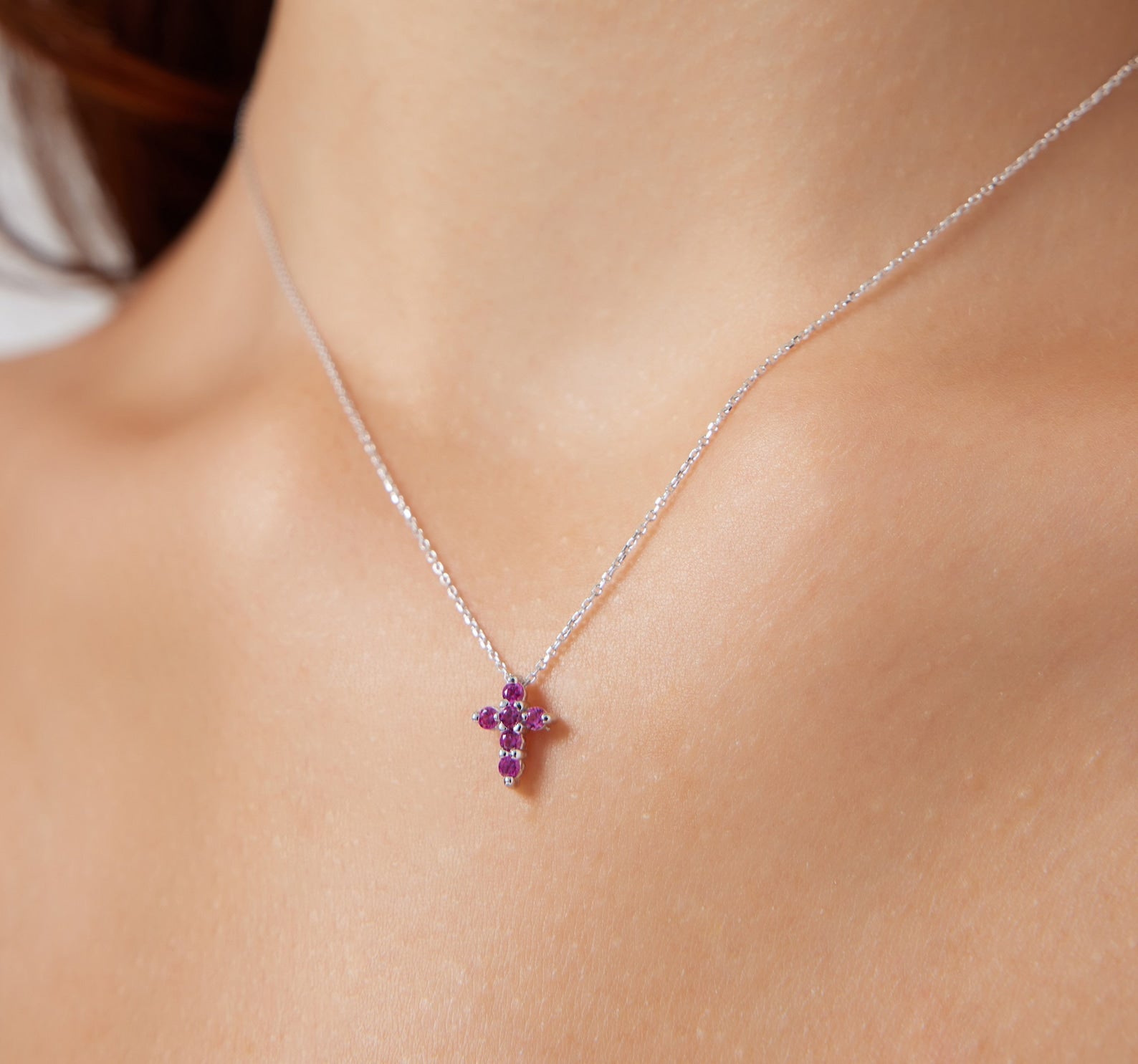 cross with ruby necklace