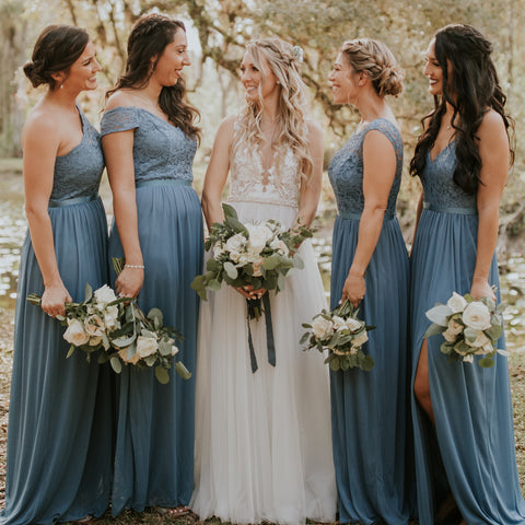 bridal party holding adore blush bridesmaid bouquet roses