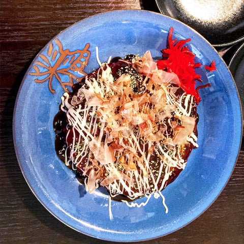 okonomiyaki on blue plate