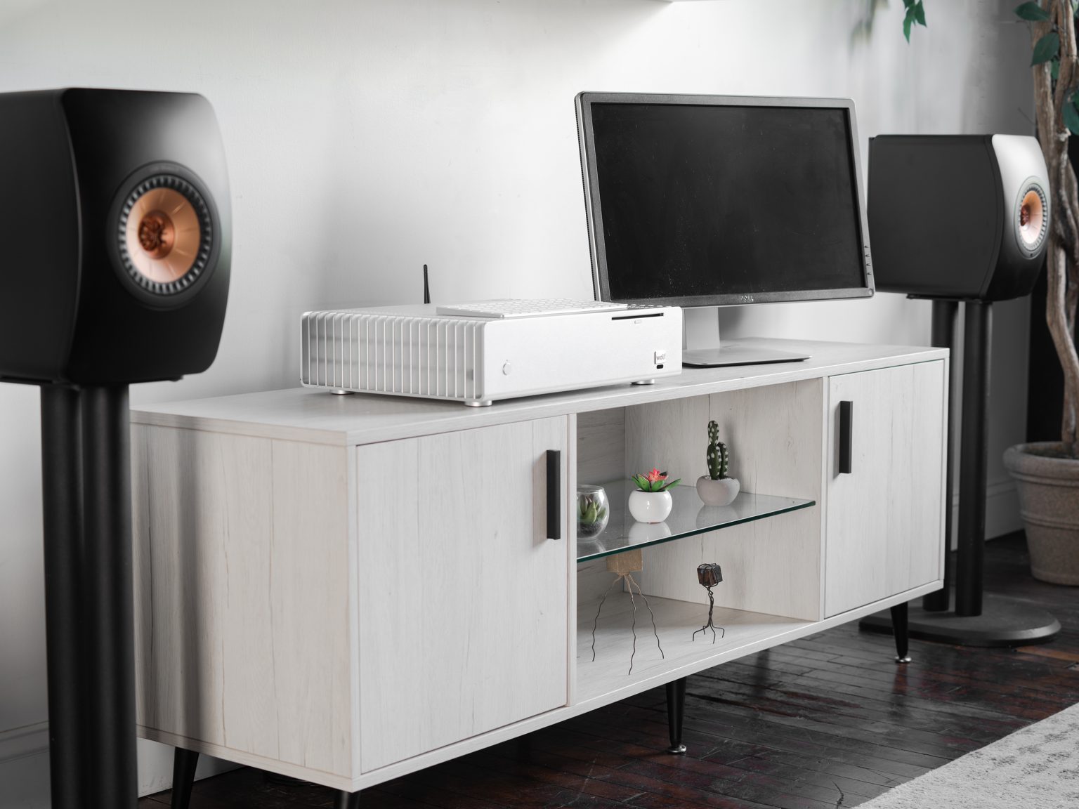 home stereo setup with KEF speakers and Wolf Audio Music Server