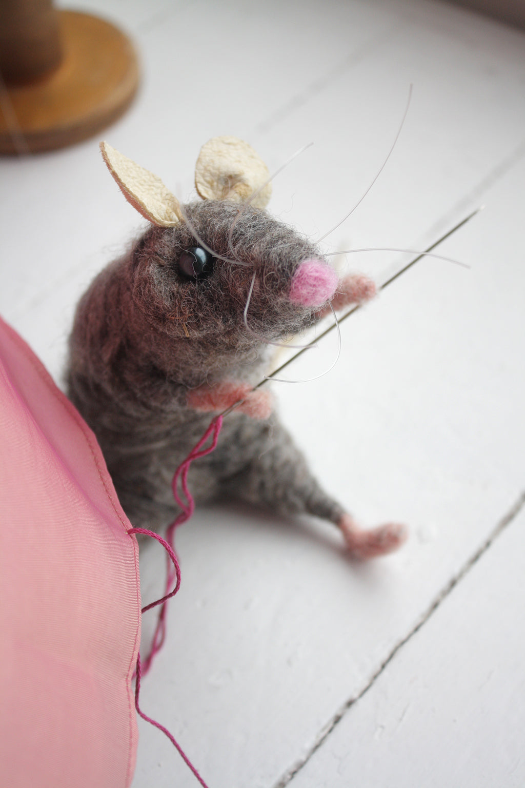 The Lunenburg Makery - Needle felted mouse in Cinderella display window.