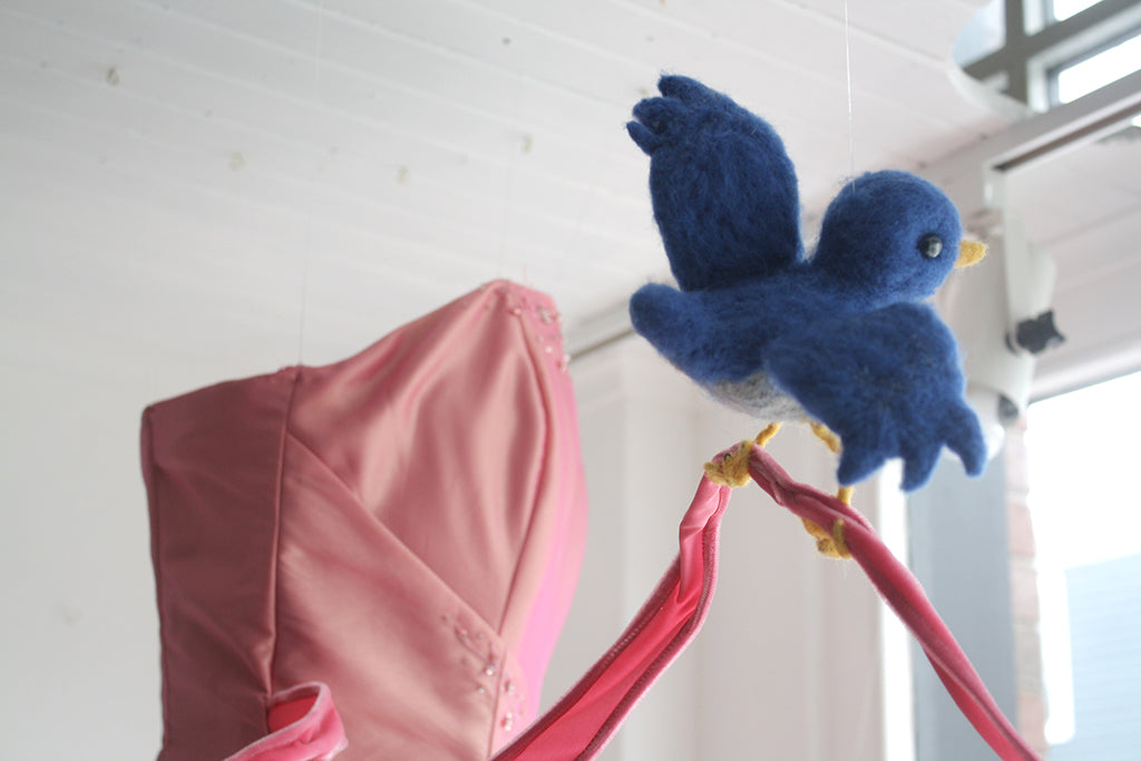 The Lunenburg Makery - Needle felted mouse in Cinderella display window.