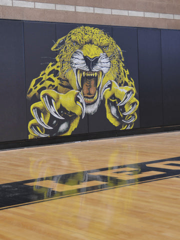 High school basketball gym wall safety panels black