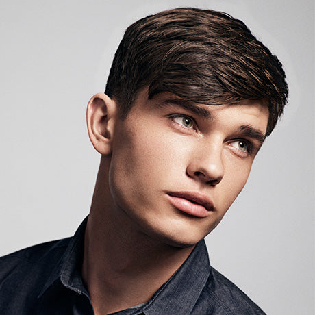 Cream Pomade is used on Thomas to give his hair a light hold, frizz-free definition and low shine.