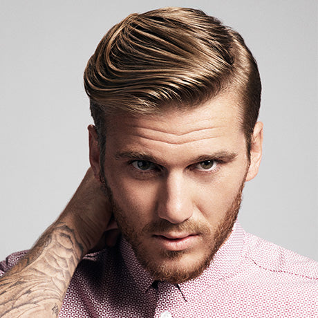 Soft Water Pomade gives Charlie's hair light hold with a natural shine.