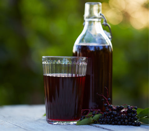 glass-filled-with-elderberry-syrup-immunity-www.rdalchemy.com