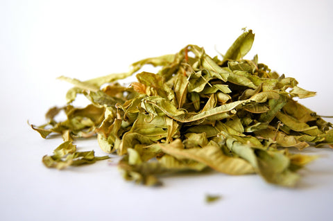 A-pile-of-green-dried-herbs-white-background-www.rdalchemy.com