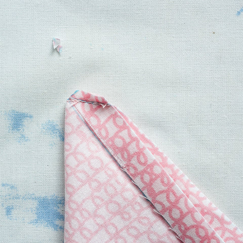 sew a mitered corner on a double fold hem