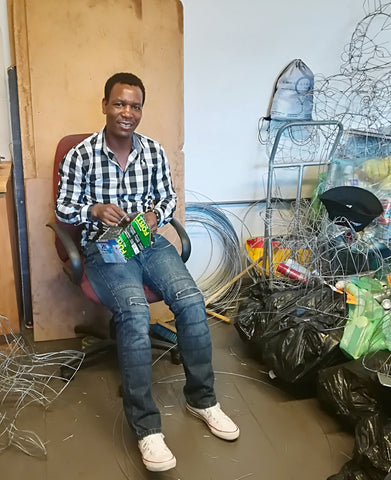 Philip at Godfrey's workshop making animals out of recycled materials #Blacklivesmatter