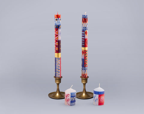 Red, white and blue taper candles and votive candles