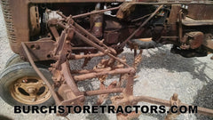 Farmall C tractor cultivator front left view