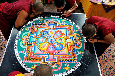 Buddhist Monk making Mandala