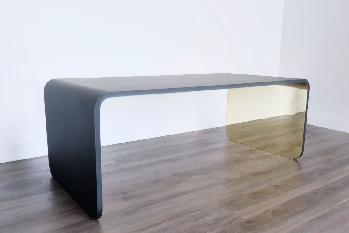 curved waterfall console table