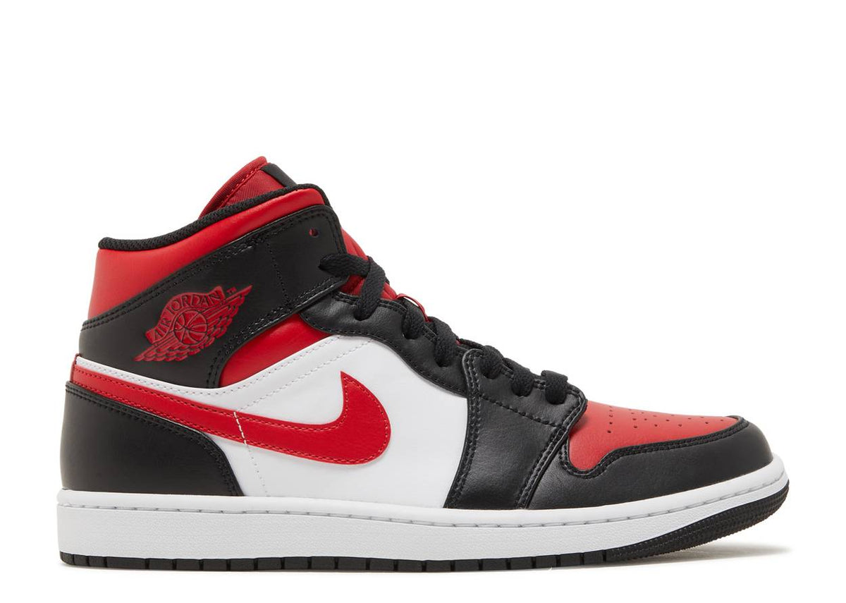 black white and red jordan 1s