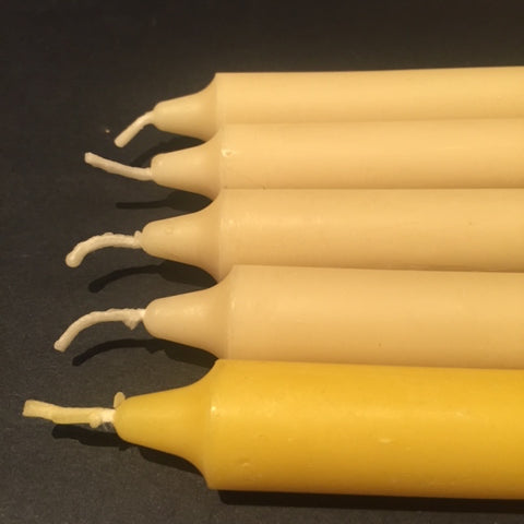 White and yellow beeswax candle sticks