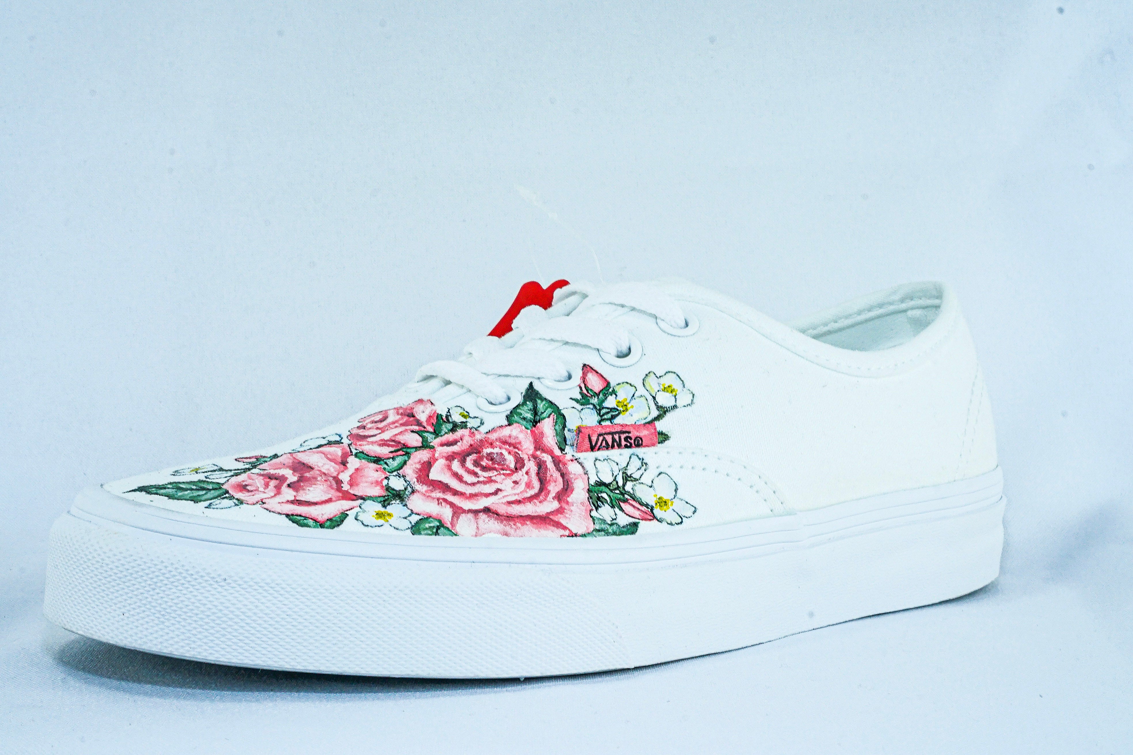 white vans with pink flowers