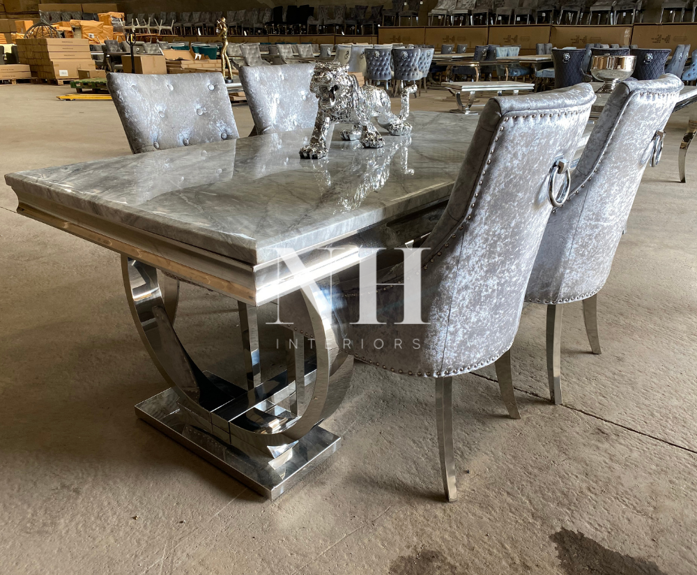 marble table crushed velvet chairs