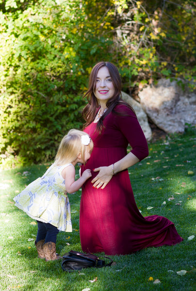 [Bump Style Approved: Pregnancy Q&A With Autumn Klair] - [Wearing Maroon Maternity Dress]