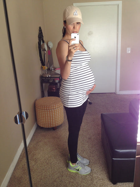 [Bump Style Approved: Pregnancy Style Q&A with Anabell Ingleton] - [Anabell Ingleton wearing Workout top and Leggings]
