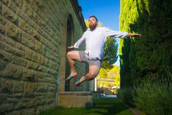 Mikey Roe in Related Garments jumping in his underwear and no-show socks at Graystone Manor in Beverly Hills