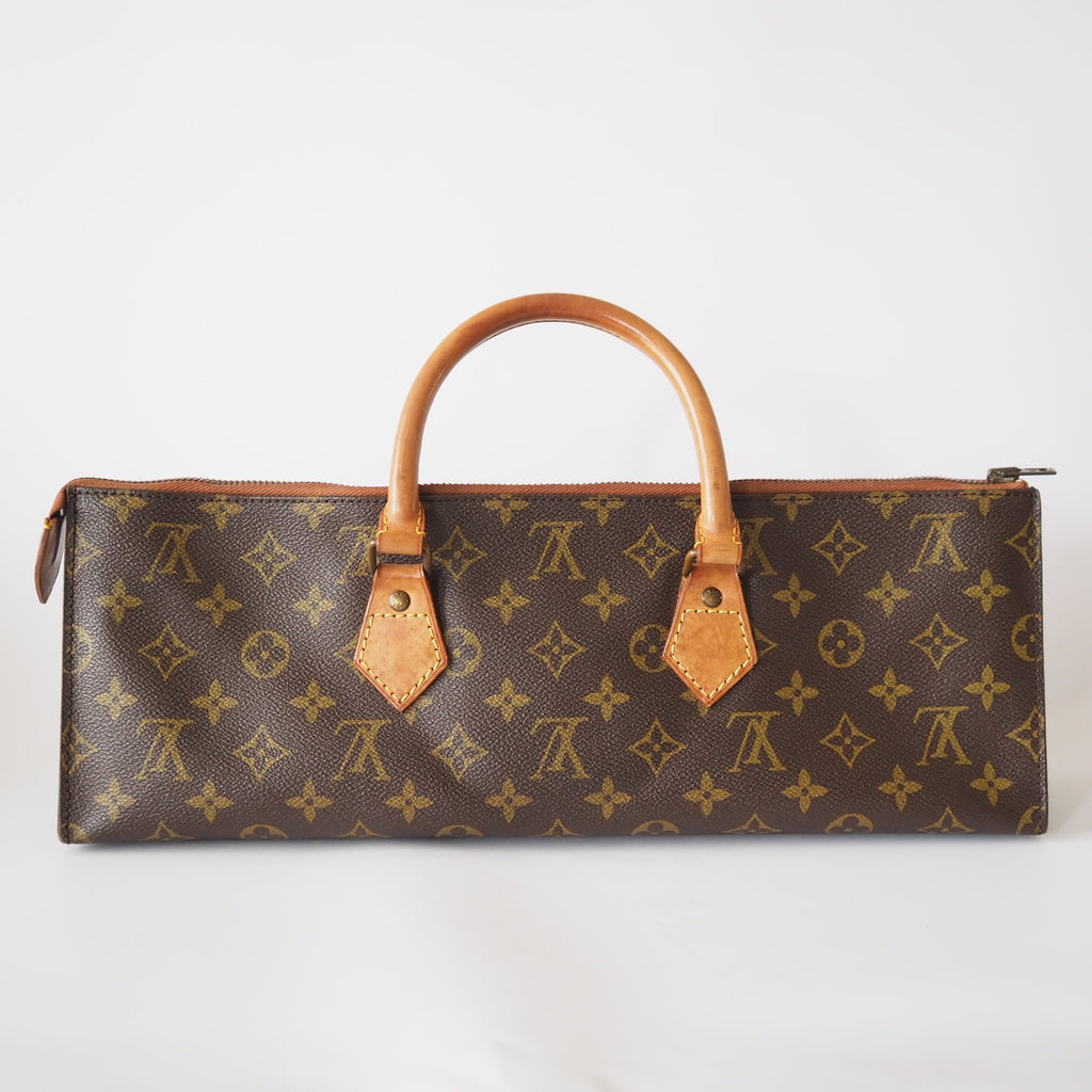 Louis Vuitton Sac Triangle Shoulder Bag Reference Guide - Spotted Fashion