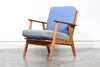 Teak and oak lounge chair with reversible cushions