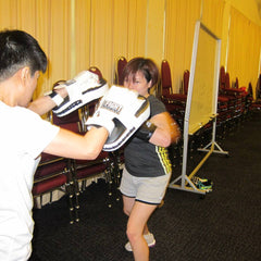 Learning some kick boxing techniques.