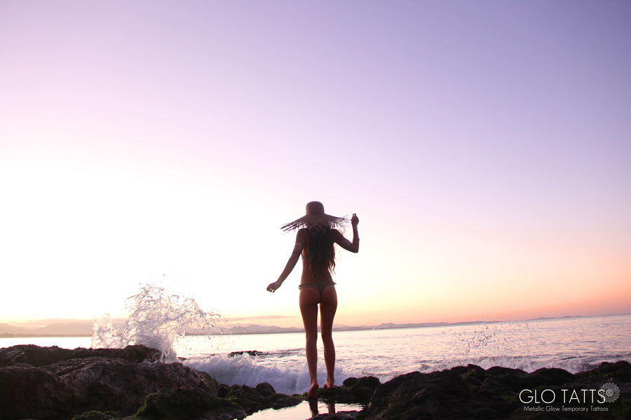 GLO TATTS flash tattoo lack of color straw hat crochet bikini Byron Bay sunset