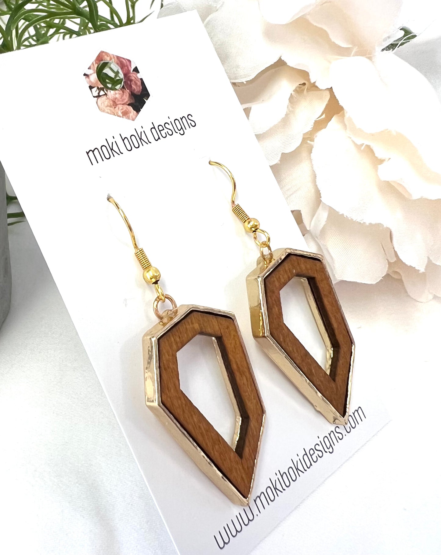Gold encased wooden drops