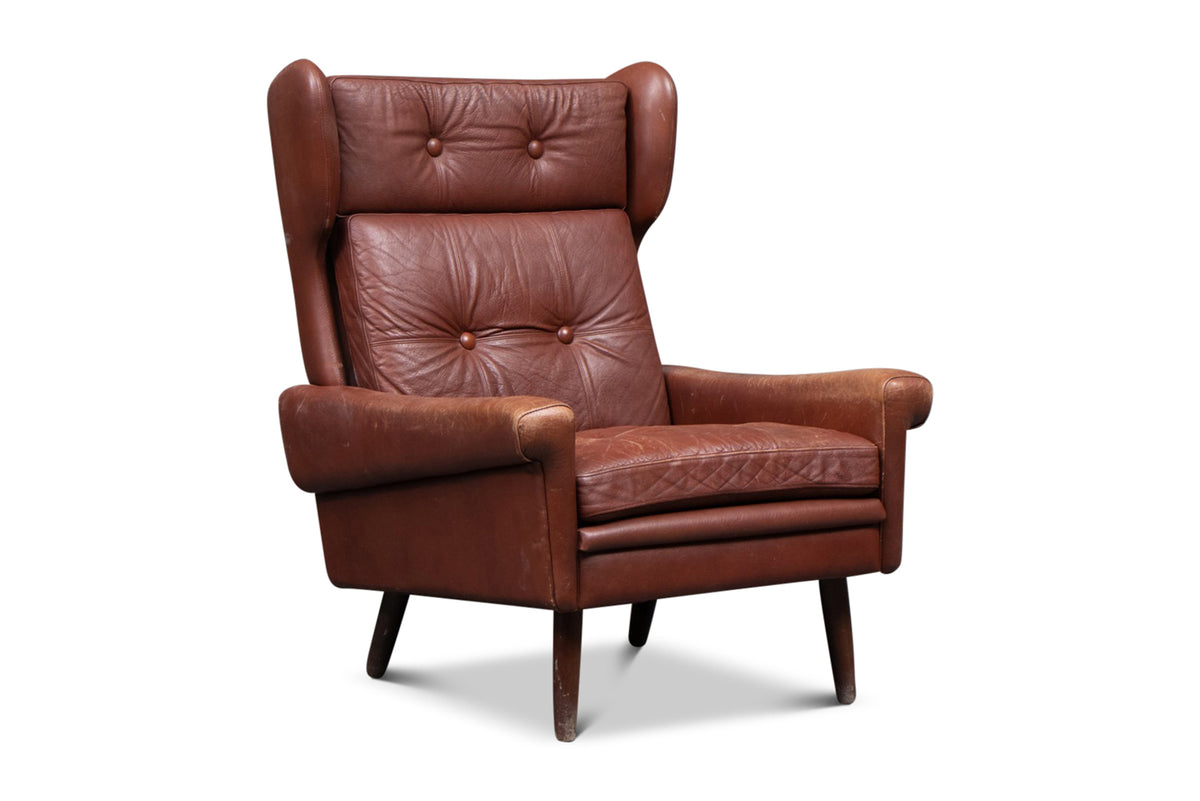 ON HOLD - SVEND SKIPPER HIGHBACK LOUNGE CHAIR IN RUST LEATHER