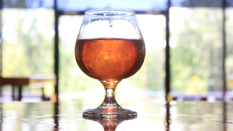 An ice ball in a pristine glass