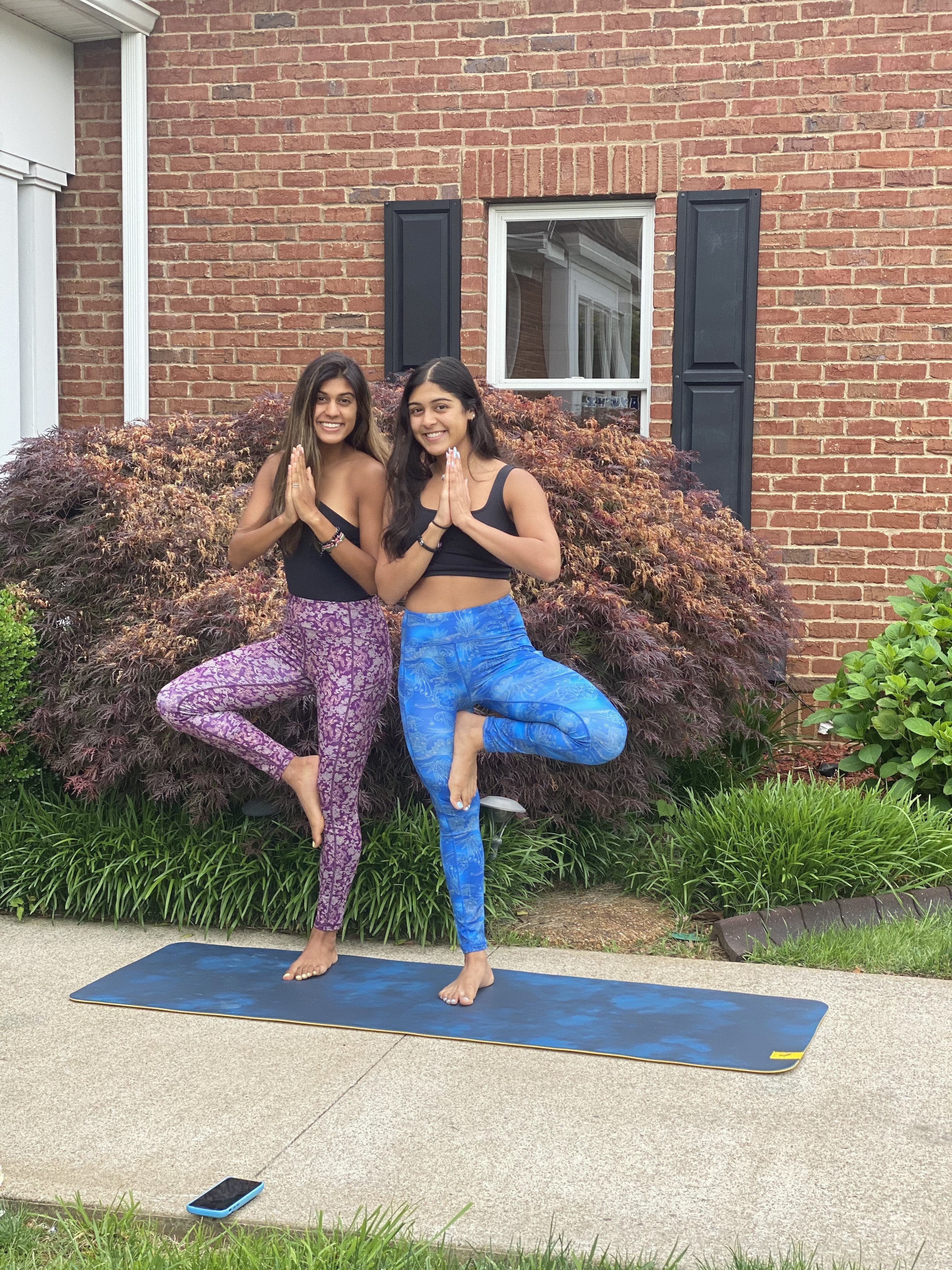 Yustha Yoga is South Asian inspired athleisure founded by two sisters, Ayushi and Astha. We grew up doing yoga with our grandparents on their “chhat
