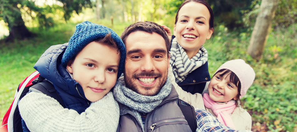 Parents with Two Small Children Outside