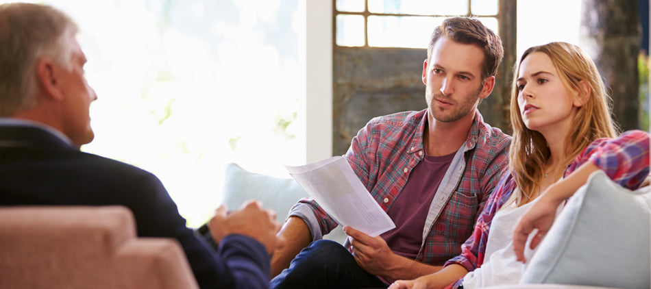 Young Couple Meeting With Funeral Director