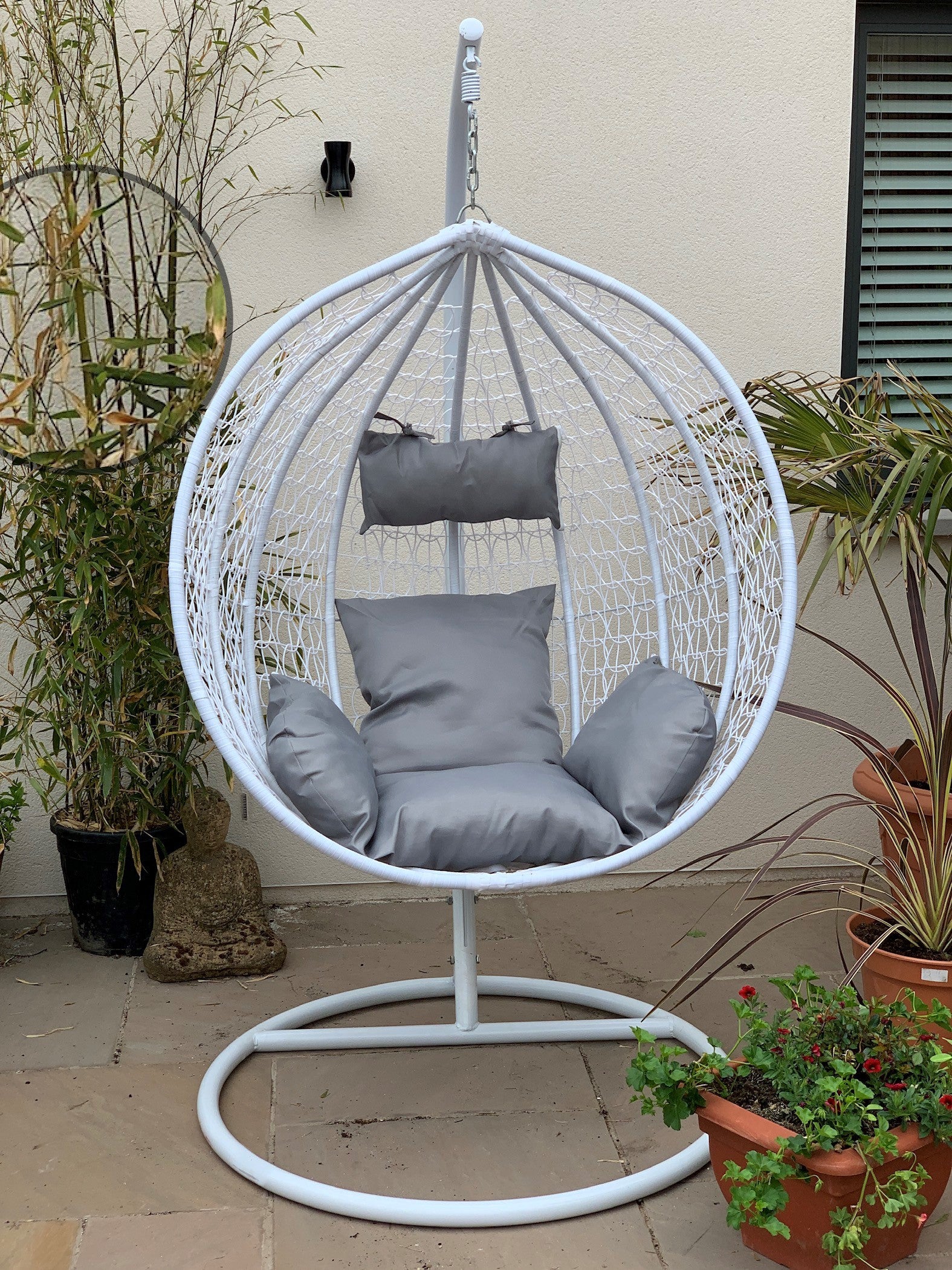 white and grey egg chair