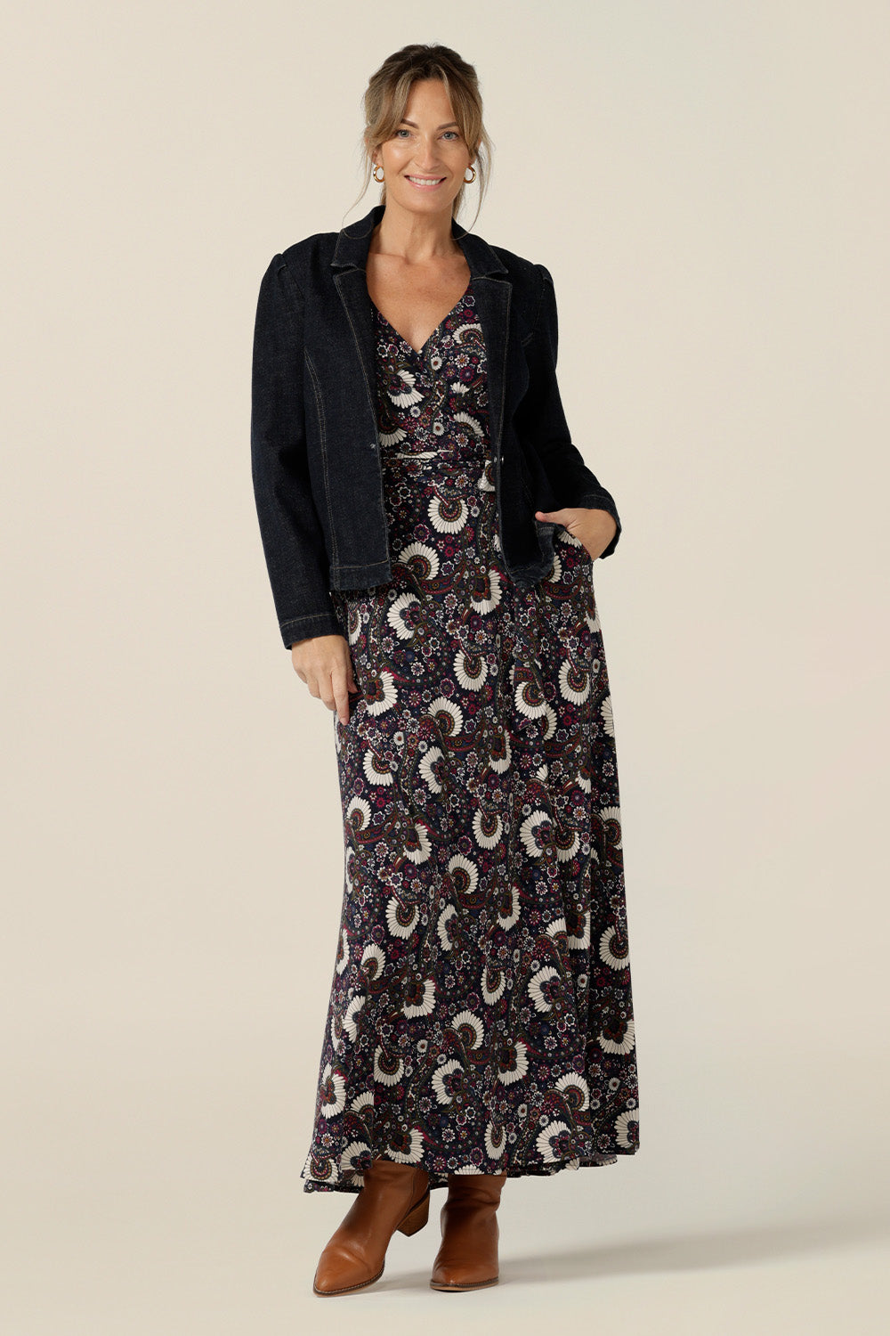 A great maxi dress for women looking for stylish 40 plus fashion, the Kimberley maxi dress has long sleeves, pockets and a V-neck. This full-length, wrap dress comes in paisley print jersey and is worn with a tailored denim jacket. Australian made and available to buy in sizes 8 to 24.