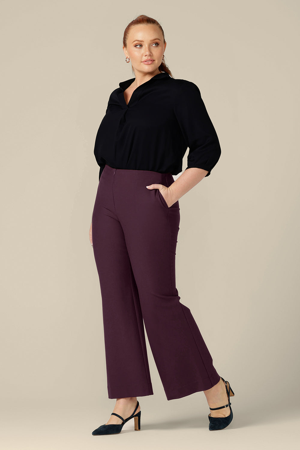 Good for workwear or evening wear pants, these navy trouser by Australia and New Zealand women's fashion label, L&F feature full-length, boot-cut flared legs. Worn with a black shirt for elegant corporate style