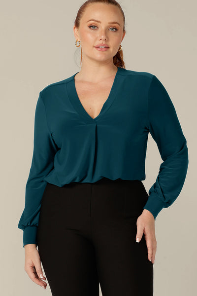 Long sleeve, V-neck top in dark teal jersey, size 12 by Australian and New Zealand women's fashion brand, L&F.
