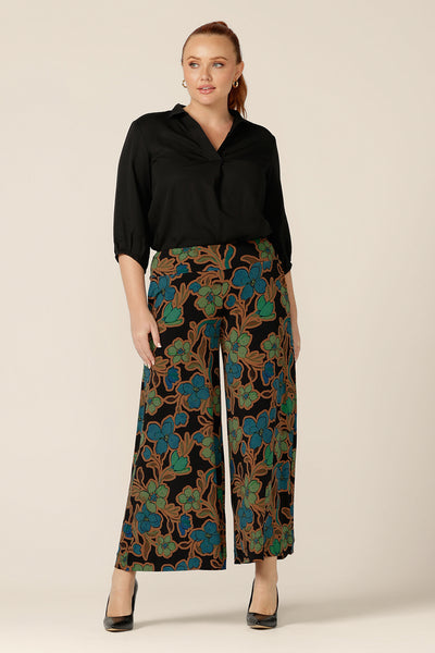 Great work wear pants for women, the Presley Pants in Secret Garden are mid-rise, pull-on trousers with wide legs and stretch jersey fabrication. Worn with a sleek black shirt, wear these pants as fluid workwear trousers or as dress pants for evening wear. 
