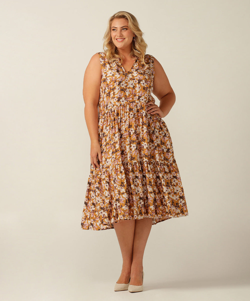 An empire line, sleeveless sun dress, the Goldie Dress in floral Siren print is lightweight and breathable in Viscose. Made in Australia for petite to plus size women. 
