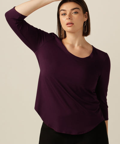 tailored top with round neckline and 3/4 length sleeves