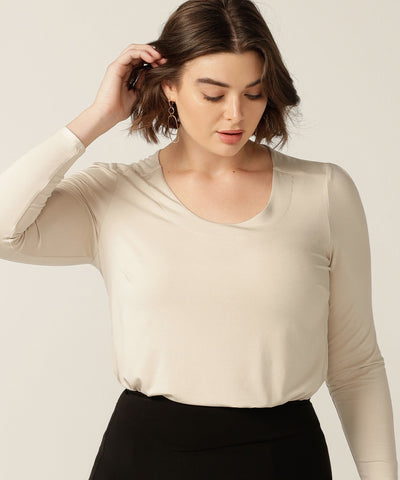 tailored top with round neckline and long sleeves