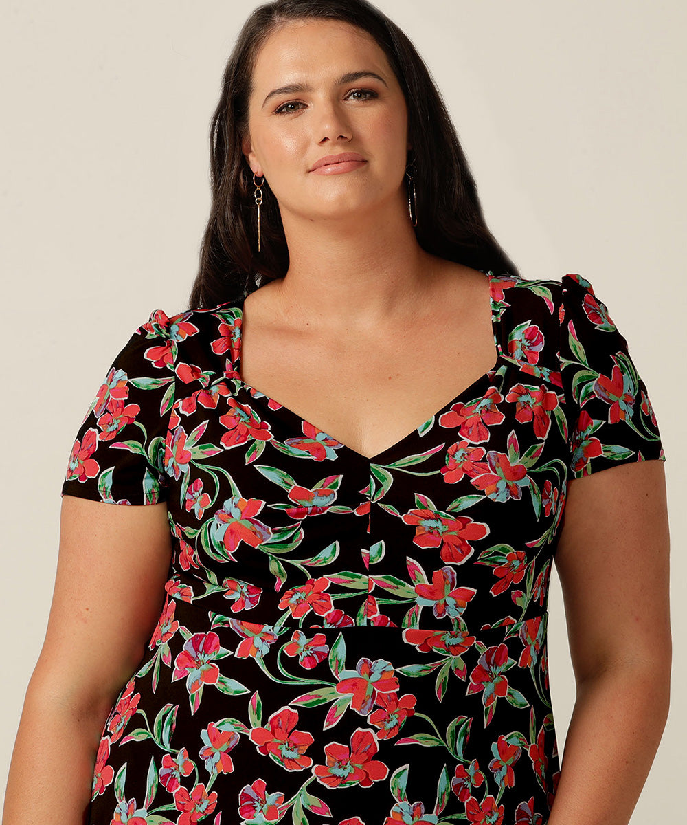 the Jillian Dress is a summer dress with sweetheart neckline and deep ruffle hem. Designer fashion, she features en exclusive floral print and is made in Australia by fit experts, Leina and Fleur for plus size women, petite sizes and fashion-conscious women building capsule wardrobes for work and travel