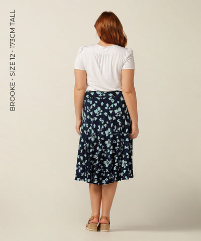 Pull-on skirt with pockets and ruffle.